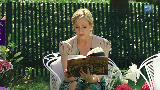 J.K Rowling, the author of the Harry Potter franchis, reading Harry Potter and the Sorcerer's Stone in the White House Garden.