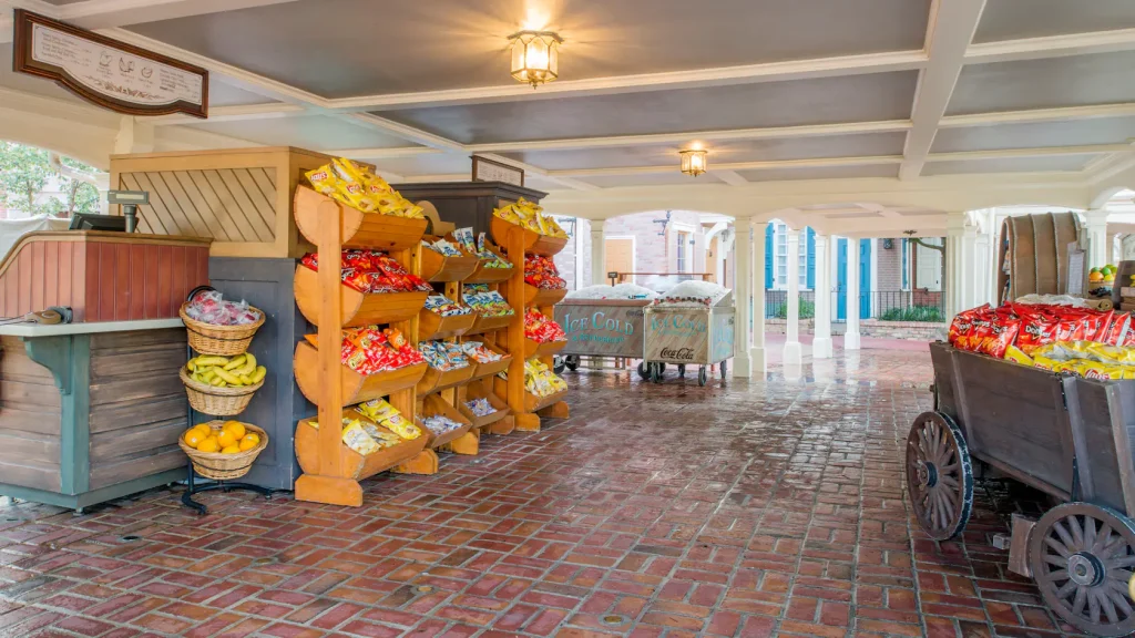 Liberty Square Market in Magic Kingdom selling snacks like Turkey Legs, Fruit, Chips, and Drinks.